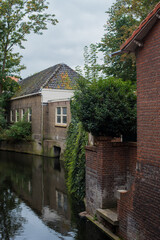 Fototapeta premium house and garden on the canal 