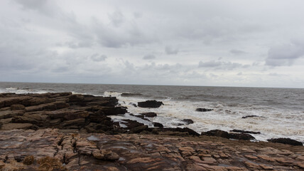 A view of the sea on a embankment of rocks