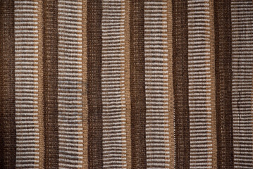 background from old striped fabric, close-up