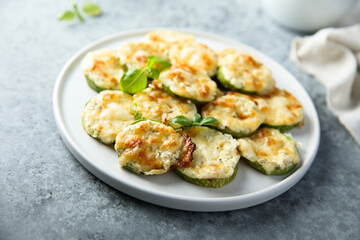 Roasted courgette with cheese and herbs