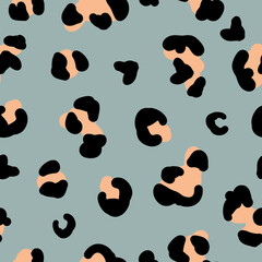 Simple trend pattern of leopard. Gray blue background, black orange spots. The print is well suited for textiles, banners and Wallpapers.