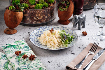 Portion of steamed rice garnish on decorated background
