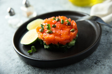 Traditional salmon tartare with capers