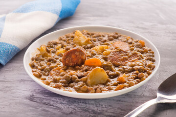 Spanish lentils with potatoes, carrot and chorizo