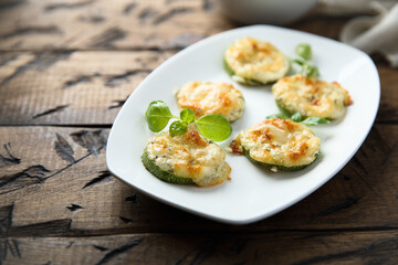 Roasted courgette with cheese and herbs