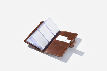 Leather business card holder from handmade on a white isolated background.