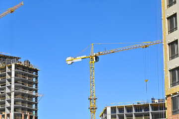 Crane and highrise construction site