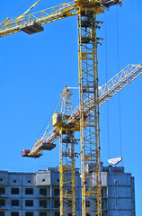 Crane and highrise construction site