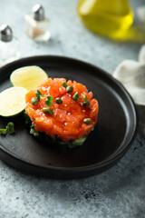 Traditional salmon tartare with capers