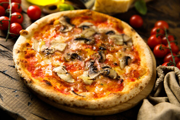 Traditional homemade pizza with mushroom and ham