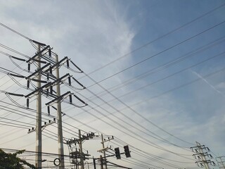 Electric poles wires and cables that connects the system to switch back and forth on the road