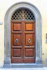 Old wooden door with metal coating