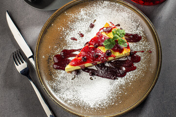 Cheesecake topped with fruit jam, delicious cheesecake with currant jam