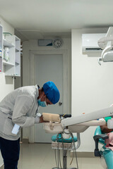 Fototapeta premium Dentist Preparing Dental Tool For Treatment