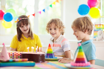 Fototapeta premium Child birthday party cake. Family with kids.