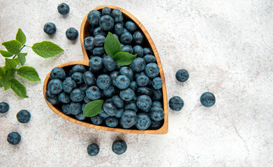 Blueberries on concrete background