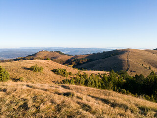 View from the mountain peak Crni vrh towards the top of Gradina on the mountain Zlatibor in Serbia during the autumn morning