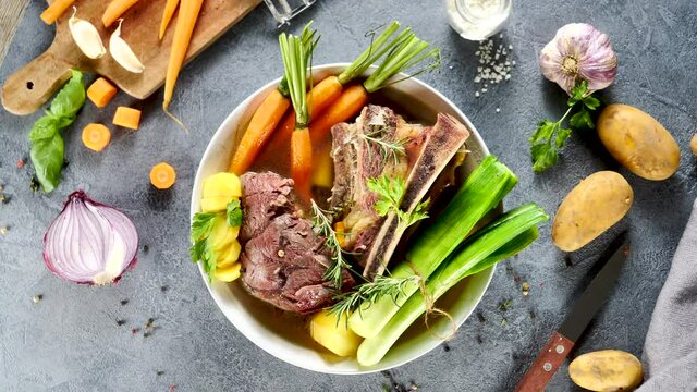 beef and vegetables with broth ( French pot au feu)