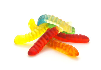 Heap of gummy candies isolated on white background. Colorful worms close up. 