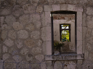 Aged window on abandoned building