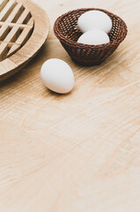 white eggs on a wooden table with chopping board