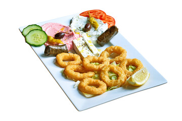 Overhead  shot of Greek mezze on plate.