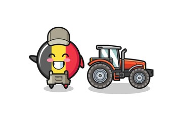 the belgium flag farmer mascot standing beside a tractor