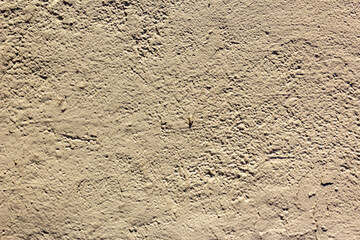 Imperfect gypsum plaster surface. Old cracked wall. Grunge wall texture for design. Old paint texture is chipping and cracked fall destruction.