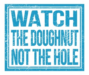 WATCH THE DOUGHNUT NOT THE HOLE, text on blue grungy stamp sign