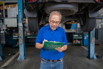 Mechanic changing engine, service car workshop automobile. professional man shop maintenance