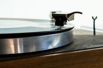 Fototapeta na wymiar Turntable with a record close-up