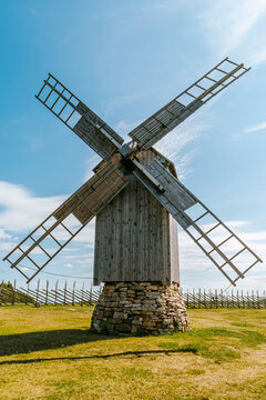 Wooden windmill with a stone base in the Angla Windmill Park in Saaremaa, Estonia.