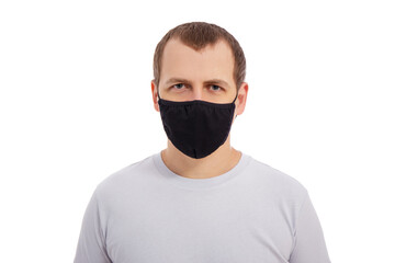 handsome man in white t-shirt wearing black medical face mask isolated on white background