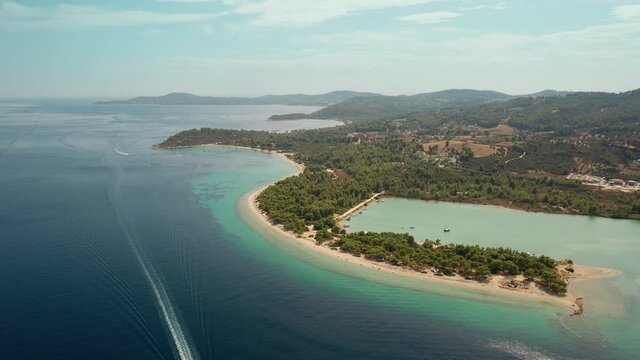 Lagoon beach, forest and fields in Halkidiki, Kassandra peninsula. Aegean sea, Greece 
