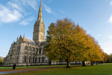 Salisbury, Wiltshire, England, UK. 2021. Salisbury Cathedral, seen with glow of the setting sun  on...