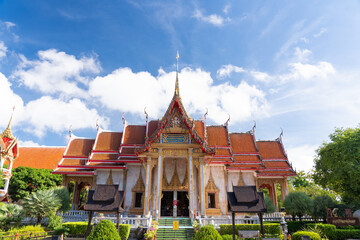 Naklejka premium thai temple Wat chalong Buddhist landmark of Phuket with cloud and famous travel in Thailand