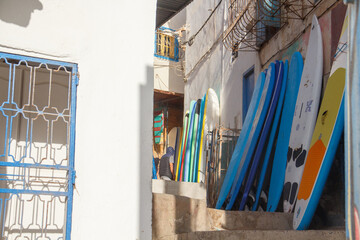 surfing boards in a village alley