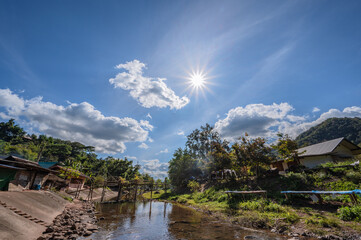 Obraz premium Landscape view of mountains and river of Boklua Village At nan Thailand.Boklua is ancient salt well in thailand .Thailand destination travel