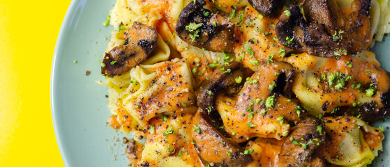 Fresh egg pasta with ricotta cheese and porcini mushrooms paste filling, delicious tortelloni