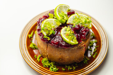 Seasoned British pork, wrapped in crisp, flavoursome pastry served with  beetroot and orange chutney on top