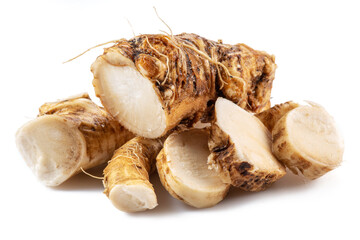 Horseradish roots close up isolated on white background.