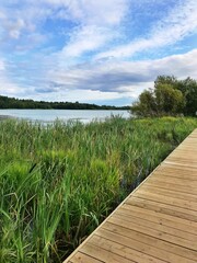 Naklejka premium wooden bridge over the lake