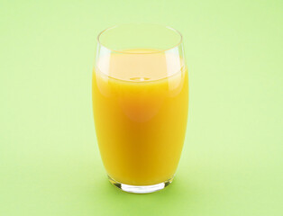 Glass of fresh orange juice isolated on light green background.