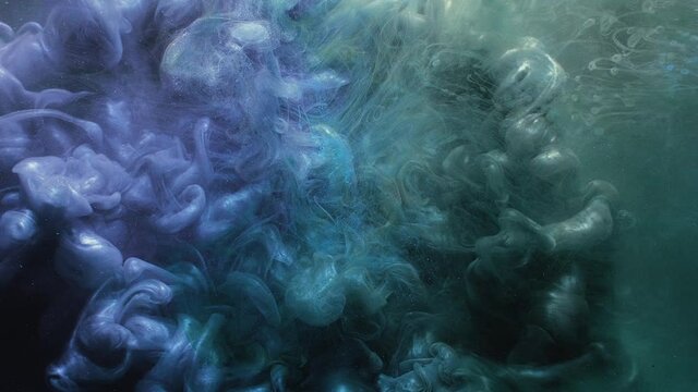 Fluid splash. Supernatural background. Ink water drop. Logo reveal. Underwater explosion. Blue purple green smoke cloud flare motion glitter dust dark abstract layer for intro.