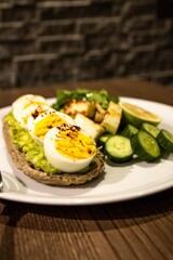 zucchini stuffed with spinach, cheese and boiled eggs