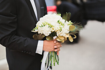 Wonderful luxury wedding bouquet of different flowers