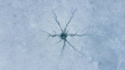 overhead view of the hole in ice