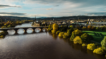 Perth, Scotland, and the River Tay in autumn colours.  Taken by drone you can see the Perth Bridges and Concert Hall
