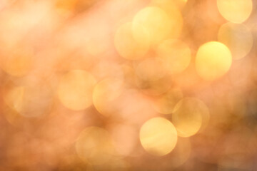 Golgen bokeh blurred glare abstract background