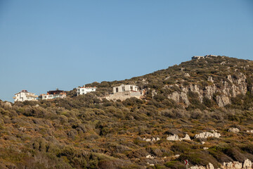 Beautiful view new houses on the mountain. Construction of houses in the mountains.